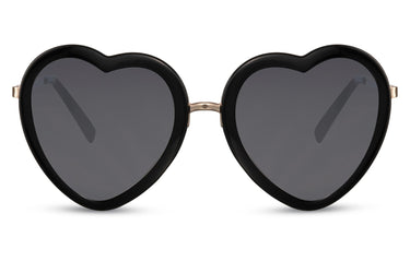 Heart-shaped sunglasses with pink lenses